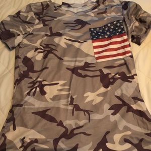 Women’s Camo t-shirt with American flag pocket.